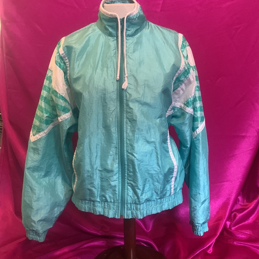 Vintage Fila size 4 teal light jacket. Mesh inside. 2 pockets. Size 4. L…